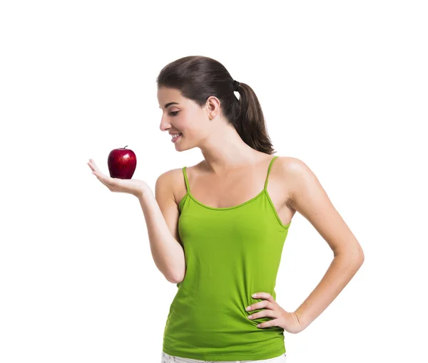Здоровая женщина держит яблоко — стоковое фото