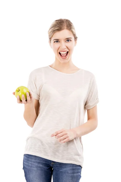 Hermosa mujer con una manzana verde — Foto de Stock