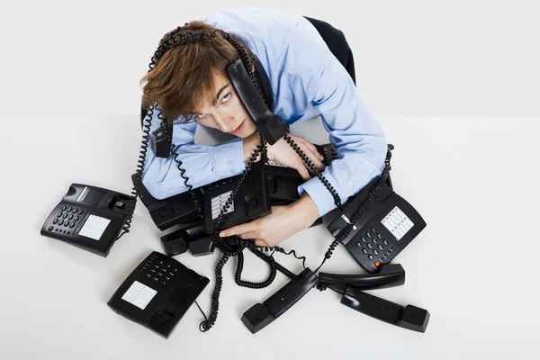 Wrapped in telephones — Stock Photo, Image