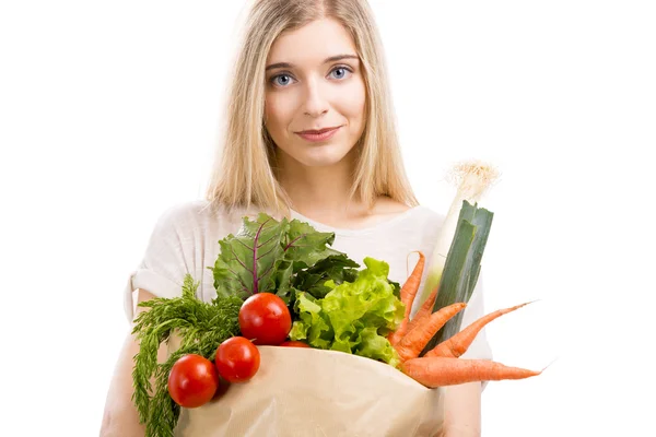 Mujer llevando bolsa de verduras —  Fotos de Stock