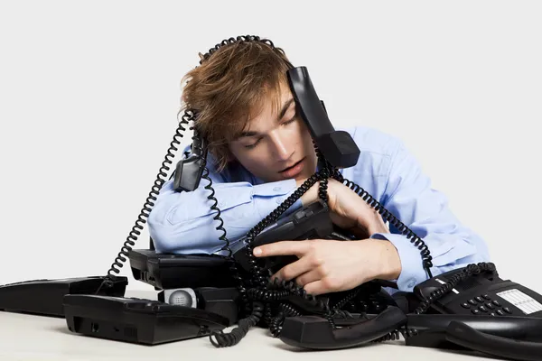 Wrapped in telephones — Stock Photo, Image