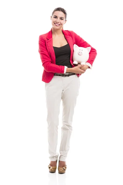 Business woman with a piggy bank — Stock Photo, Image