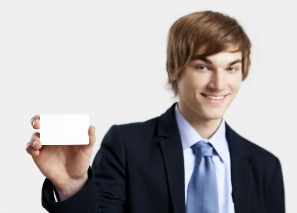 Businessman holding a business card — Stock Photo, Image