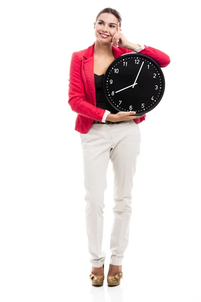 Mujer de negocios sosteniendo un reloj —  Fotos de Stock