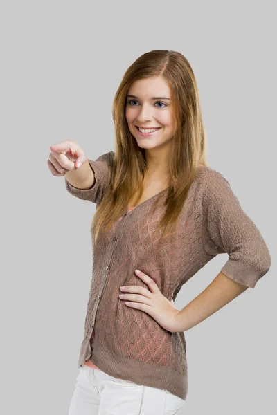 Kvinna som pekar någonstans — Stockfoto