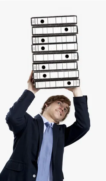 Business man carrying folders — Stock Photo, Image