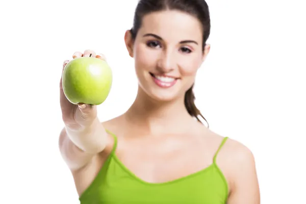 Υγιή γυναίκα με ένα πράσινο μήλο — Φωτογραφία Αρχείου