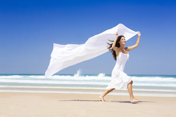 Jumping with a white scarf — Stock Photo, Image