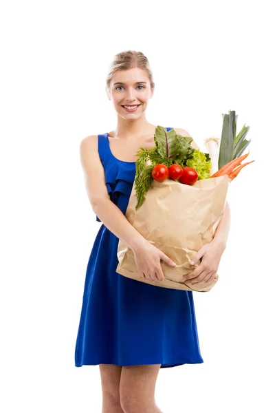 Bella donna che trasporta verdure — Foto Stock