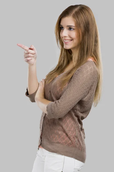 Woman pointing somewhere — Stock Photo, Image