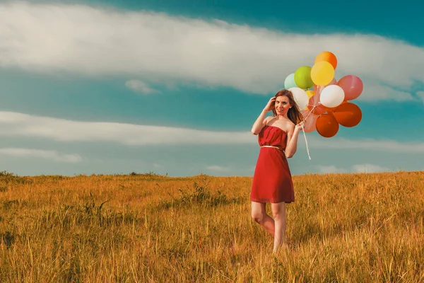 Young Woman Field Holding Colorful Balloons — 图库照片