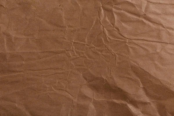 Ragged pognieciony brązowy papier kraft tekstury i pełne tło ramki — Zdjęcie stockowe