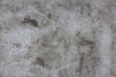 Kusursuz bir doku ve tam çerçeve arkaplan olarak alçılı gri beton duvar yüzeyi
