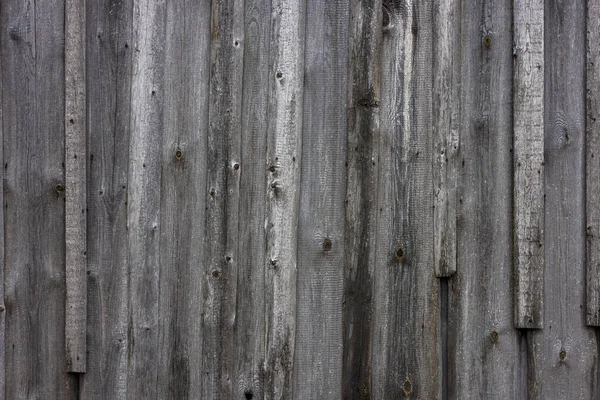 Old dry weathered gray wooden planks board surface - full frame background and texture — Stock Photo, Image