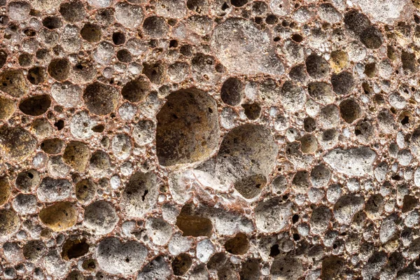 Macro tiro de pedra-pomes usada com sujeira e pele morta dentro dos poros — Fotografia de Stock