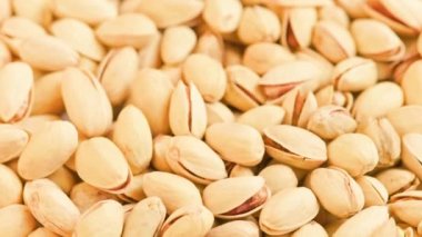 Dönen şam fıstıkları tam kare yakın plan