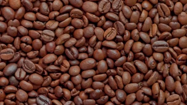 Повний рамковий петлевий прядіння фону смажених кавових зерен — стокове відео