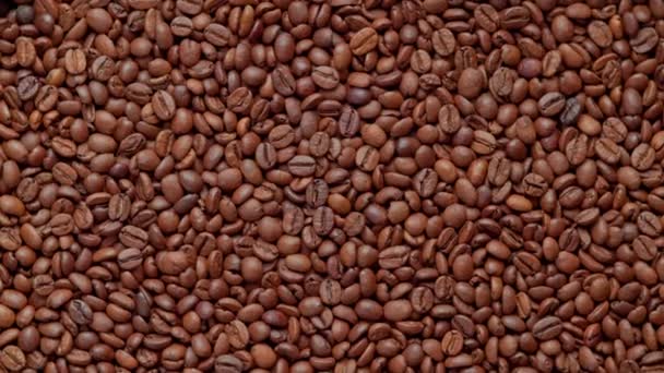 烤咖啡豆的全框架环状纺丝背景 — 图库视频影像