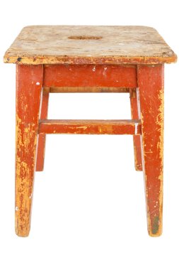 Old wooden stool with brown peeling paint. Loft style chair isolated on a white background. clipart
