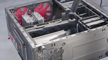 Process of cleaning of black persolnal computer case, closeup with slo-mo