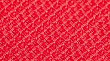 close-up macro view of red velcro surface with micro hooks