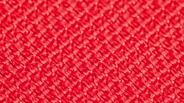 Γκρο πλαν μακροσκοπική άποψη της κόκκινης επιφάνειας velcro με μικρο άγκιστρα — Αρχείο Βίντεο