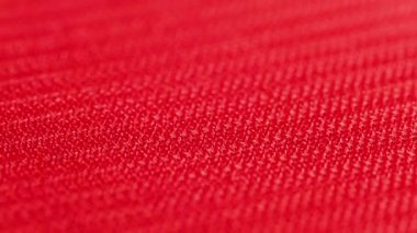 close-up macro view of red velcro surface with micro hooks