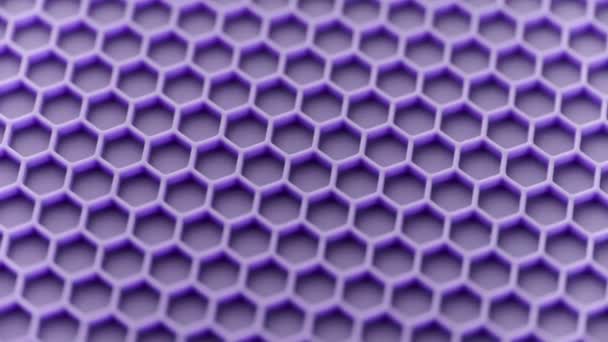 Abstract purple honeycomb pattern looped spinning full-frame background — Vídeos de Stock