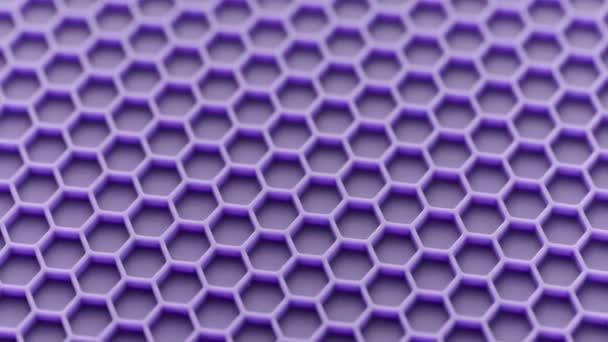 Abstract purple honeycomb pattern looped spinning full-frame background — Stock video