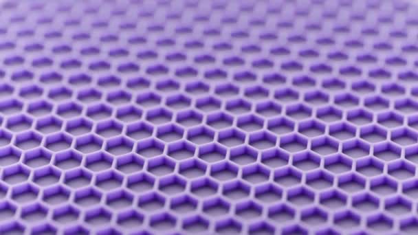 Abstract purple honeycomb pattern looped spinning full-frame background — Vídeos de Stock