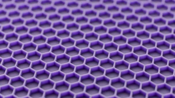 Abstract purple honeycomb pattern looped spinning full-frame background — Vídeo de Stock