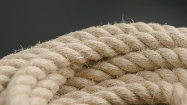 Spinning looped rotating background of coiled rope — Stock Video
