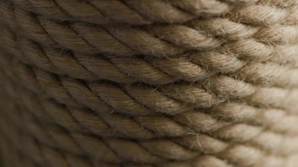 Spinning looped rotating background of coiled rope — Vídeos de Stock