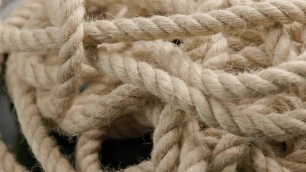 Spinning looped rotating background of entangled rope — Stock videók