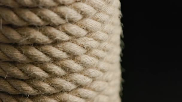 缠绕着盘绕着盘绕着的绳子的旋转背景 — 图库视频影像