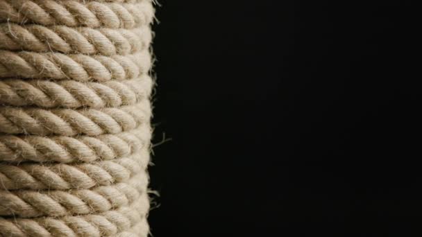 Spinning looped rotating background of coiled rope — Vídeos de Stock