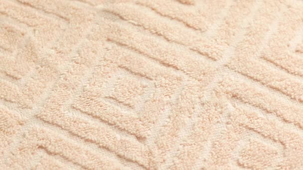 Closeup loopable background of beige soft cotton towel — Stock videók
