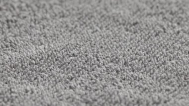 closeup loopable background of gray soft cotton towel