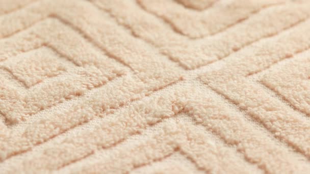 Closeup loopable background of beige soft cotton towel — Stok video