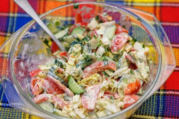 Vegetable salad with mayonnaise sauce in glass bowl — Stok Foto