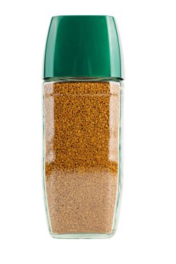 glass jar of instant coffee with green cap isolated on white background