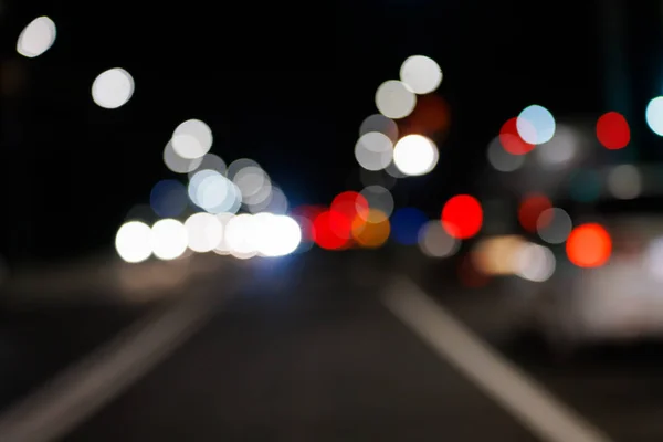 Defocused Night Street View Drivers Perspective Bokeh Blur Street Lights — Stockfoto