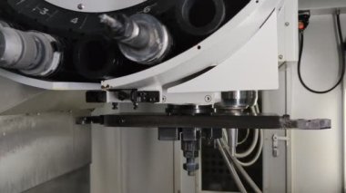automatic tool change in modern vertical cnc milling machine.