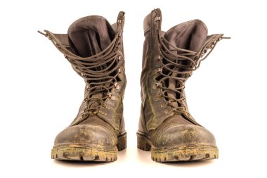 dirty military style light ankle boots isolated on white background - front view
