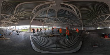 Seamless full spherical 360 degree panorama in equirectangular projection of concrete floor filling process in industrial building in Tula, Russia - June 4, 2013