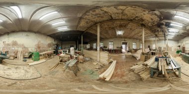 Seamless full spherical 360 degree panorama in equirectangular projection of carpentry workshop in abandoned building in Tula, Russia - July 8, 2015