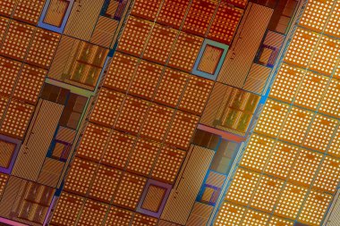 Silicon monocrystalline wafer with microchips after photolithography etching manufacturing used in fabrication of electronic integrated circuits. Full-frame high-tech macro background.