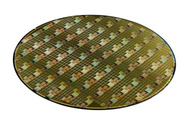 Silicon wafer with microchips used in electronics for the fabrication of integrated circuits. Whole circle isolated on white background with clipping path.