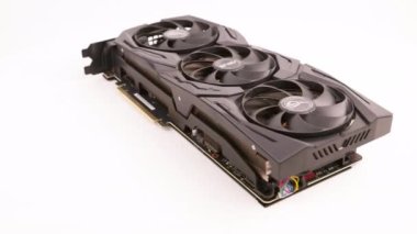 Asus ROG Strix Advanced Nvidia RTX 2070 super - big black contemporary gaming graphics card loopable spinning on white background in Tula, Russia, - July 27, 2022