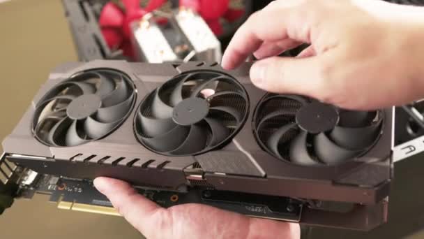 Caucasian Hands Spinning Fans Large Air Cooled Computer Graphic Card — Video Stock